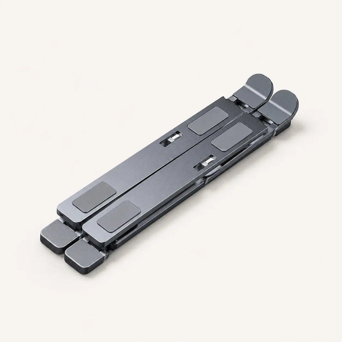 Support ordinateur portable pliable rangé en format compact